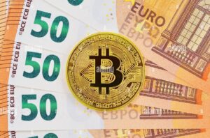 bitcoin-and-euro-notes-close-up-2J88HWG